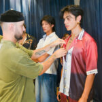 Nacido en Bogotá, Colombia, Camilo Figueroa  es un joven que pertenece a una generación que no pidió permiso para crear.  
Desde sus inicios, su sensibilidad estuvo marcada por el arte multimedia y una atracción inevitable hacia el cine y los lenguajes audiovisuales. Consolidando su universo creativo, entendió algo clave: el arte también se construye en el mundo real. Así, entre emprendimientos locales y pequeñas empresas, comenzó a moldear una visión que pronto rompería los límites de lo convencional.

Su primer gran movimiento llegó junto a la empresa de vehículos Francesa Renault, en una era donde las redes sociales apenas despertaban.   Mientras el mundo aprendía a usarlas, Camilo ya las reinterpretaba. No creaba contenido: creaba identidad. 
Ese impulso lo llevó a colaborar con marcas como Bavaria, Pernod Ricard, Postobon, Corona, y a trabajar con medios internacionales como VICE, EXCLAMA y The Hollywood Reporter, donde su mirada comenzó a posicionarse como una firma visual reconocible: impactante, moderna y deliberadamente atrevida. 
Su lente ha cruzado fronteras capturando modelos internacionales, ferias de moda como Bogotá Fashion Week y Colombiamoda, y producciones en escenarios como Italia y México, donde consolidó una estética que dialoga entre el lujo contemporáneo y la narrativa visual artistica.  
Fotografo del DJ internacional Claptone, del sello Defected Records, acompañándolo en presentaciones en Colombia, México y escenarios globales como Zamna en Tulum. De ese encuentro surgió también una portada para el Ibiza Radio Show, una emisora emblemática de la isla Española marcando un hito en su proyección internacional. 
Cada imagen de Camilo desafía lo esperado. Hay una intención estética clara: romper el esquema tradicional e introducir una chispa de lujo que transforma cada fotografía en una pieza digna de exhibición.
Sus obras no se consumen. Se coleccionan. 
Tras un viaje decisivo a Italia, comprendió el valor del papel en una era dominada por lo digital. Fue entonces cuando fundó 24PRINTS, un proyecto enfocado en la materialización del arte fotográfico: libros, cuadros y piezas impresas que elevan la imagen a objeto tangible. Su trabajo ha sido llevado a modelos, agencias, deportistas incluyendo el polo, marcas, empresas y figuras públicas, construyendo colecciones valoradas en millones de pesos.
Más que clientes, construye una comunidad.  Sus clientes entienden el peso, la permanencia y el prestigio de poseer una obra suya.
Hoy, como estudiante de cine y televisión, Camilo expande su lenguaje hacia nuevas dimensiones, explorando el audiovisual y la inteligencia artificial como herramientas para redefinir la creación contemporánea.