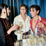 Nacido en Bogotá, Colombia, Camilo Figueroa  es un joven que pertenece a una generación que no pidió permiso para crear.  
Desde sus inicios, su sensibilidad estuvo marcada por el arte multimedia y una atracción inevitable hacia el cine y los lenguajes audiovisuales. Consolidando su universo creativo, entendió algo clave: el arte también se construye en el mundo real. Así, entre emprendimientos locales y pequeñas empresas, comenzó a moldear una visión que pronto rompería los límites de lo convencional.

Su primer gran movimiento llegó junto a la empresa de vehículos Francesa Renault, en una era donde las redes sociales apenas despertaban.   Mientras el mundo aprendía a usarlas, Camilo ya las reinterpretaba. No creaba contenido: creaba identidad. 
Ese impulso lo llevó a colaborar con marcas como Bavaria, Pernod Ricard, Postobon, Corona, y a trabajar con medios internacionales como VICE, EXCLAMA y The Hollywood Reporter, donde su mirada comenzó a posicionarse como una firma visual reconocible: impactante, moderna y deliberadamente atrevida. 
Su lente ha cruzado fronteras capturando modelos internacionales, ferias de moda como Bogotá Fashion Week y Colombiamoda, y producciones en escenarios como Italia y México, donde consolidó una estética que dialoga entre el lujo contemporáneo y la narrativa visual artistica.  
Fotografo del DJ internacional Claptone, del sello Defected Records, acompañándolo en presentaciones en Colombia, México y escenarios globales como Zamna en Tulum. De ese encuentro surgió también una portada para el Ibiza Radio Show, una emisora emblemática de la isla Española marcando un hito en su proyección internacional. 
Cada imagen de Camilo desafía lo esperado. Hay una intención estética clara: romper el esquema tradicional e introducir una chispa de lujo que transforma cada fotografía en una pieza digna de exhibición.
Sus obras no se consumen. Se coleccionan. 
Tras un viaje decisivo a Italia, comprendió el valor del papel en una era dominada por lo digital. Fue entonces cuando fundó 24PRINTS, un proyecto enfocado en la materialización del arte fotográfico: libros, cuadros y piezas impresas que elevan la imagen a objeto tangible. Su trabajo ha sido llevado a modelos, agencias, deportistas incluyendo el polo, marcas, empresas y figuras públicas, construyendo colecciones valoradas en millones de pesos.
Más que clientes, construye una comunidad.  Sus clientes entienden el peso, la permanencia y el prestigio de poseer una obra suya.
Hoy, como estudiante de cine y televisión, Camilo expande su lenguaje hacia nuevas dimensiones, explorando el audiovisual y la inteligencia artificial como herramientas para redefinir la creación contemporánea.